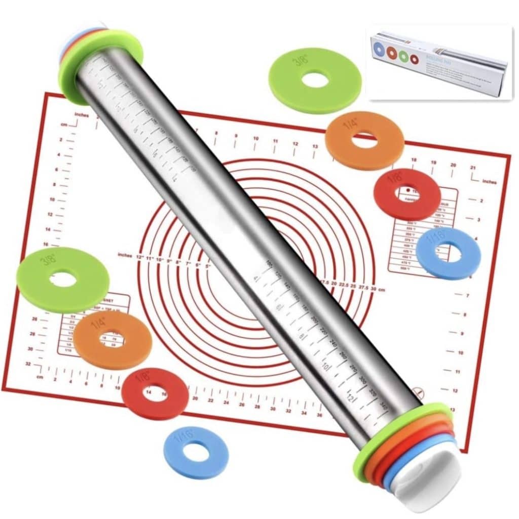 Adjustable stainless steel rolling pin with removable colorful rings and a measurement mat, perfect for achieving precise dough thickness for your favorite Costco Pumpkin Pie Recipe. Packaging shown in the corner.